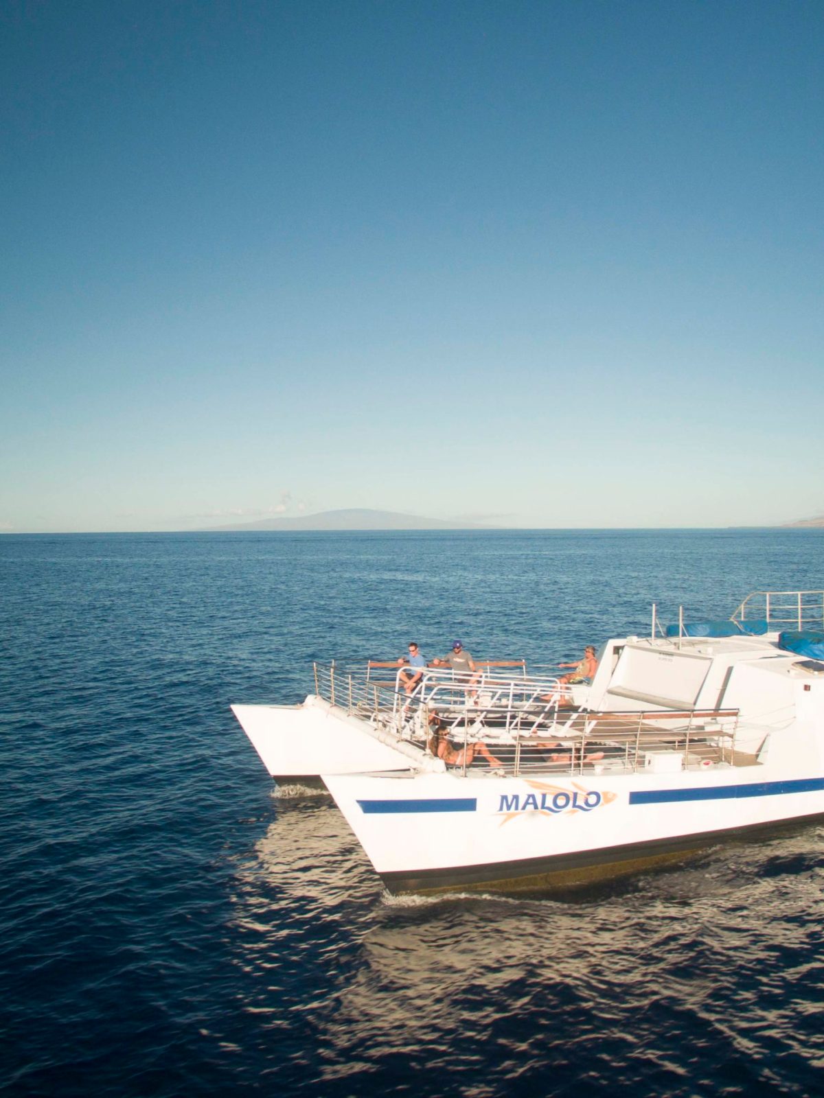 a small boat in a large body of water