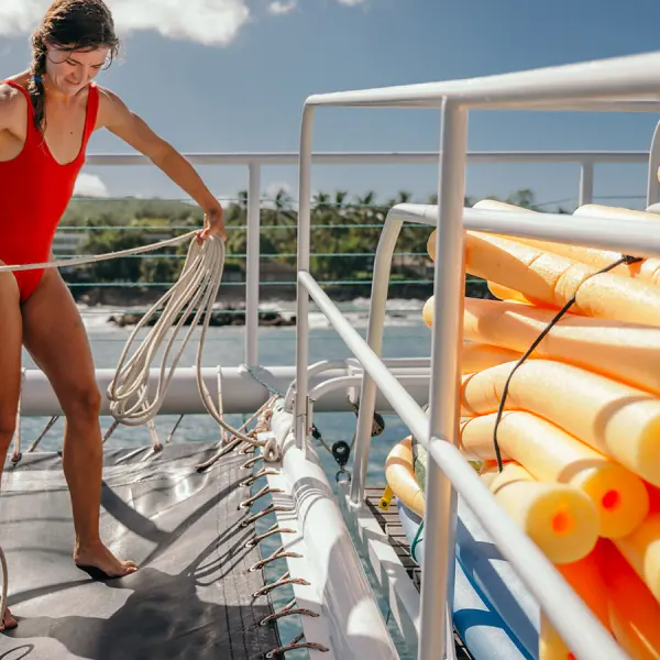 a woman standing on a beach
