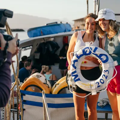 a group of people standing next to a person