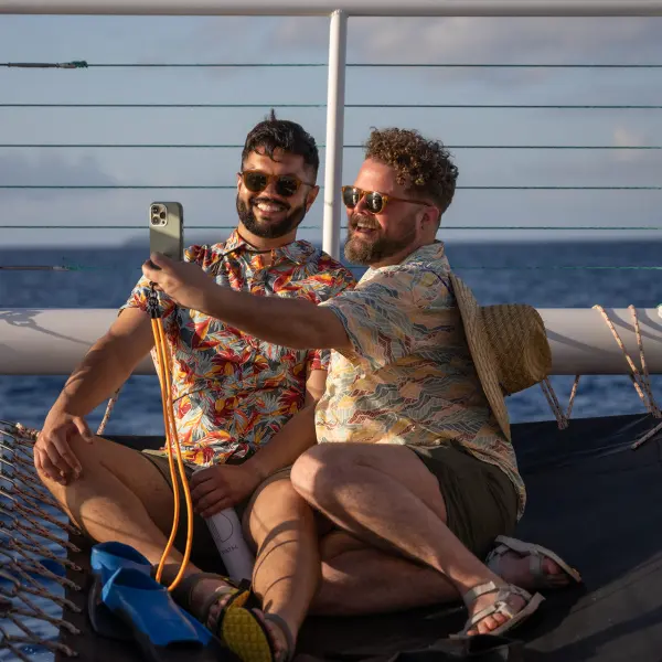 a man and a woman sitting on a bench