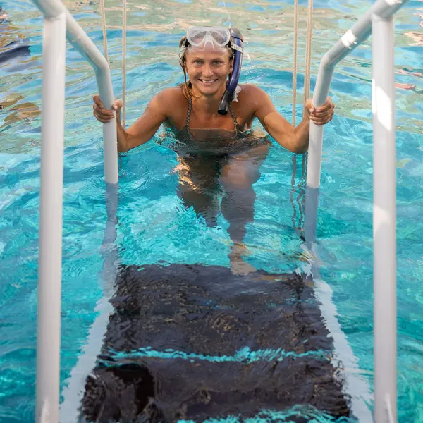 a girl in a pool of water