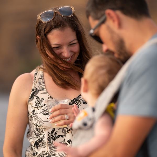 a man and a woman looking at the camera