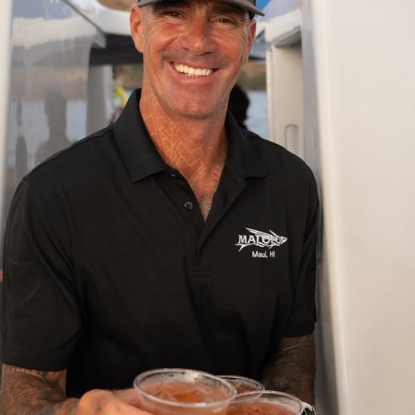 a man drinking from a cup