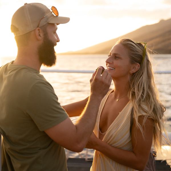 a woman standing on a beach